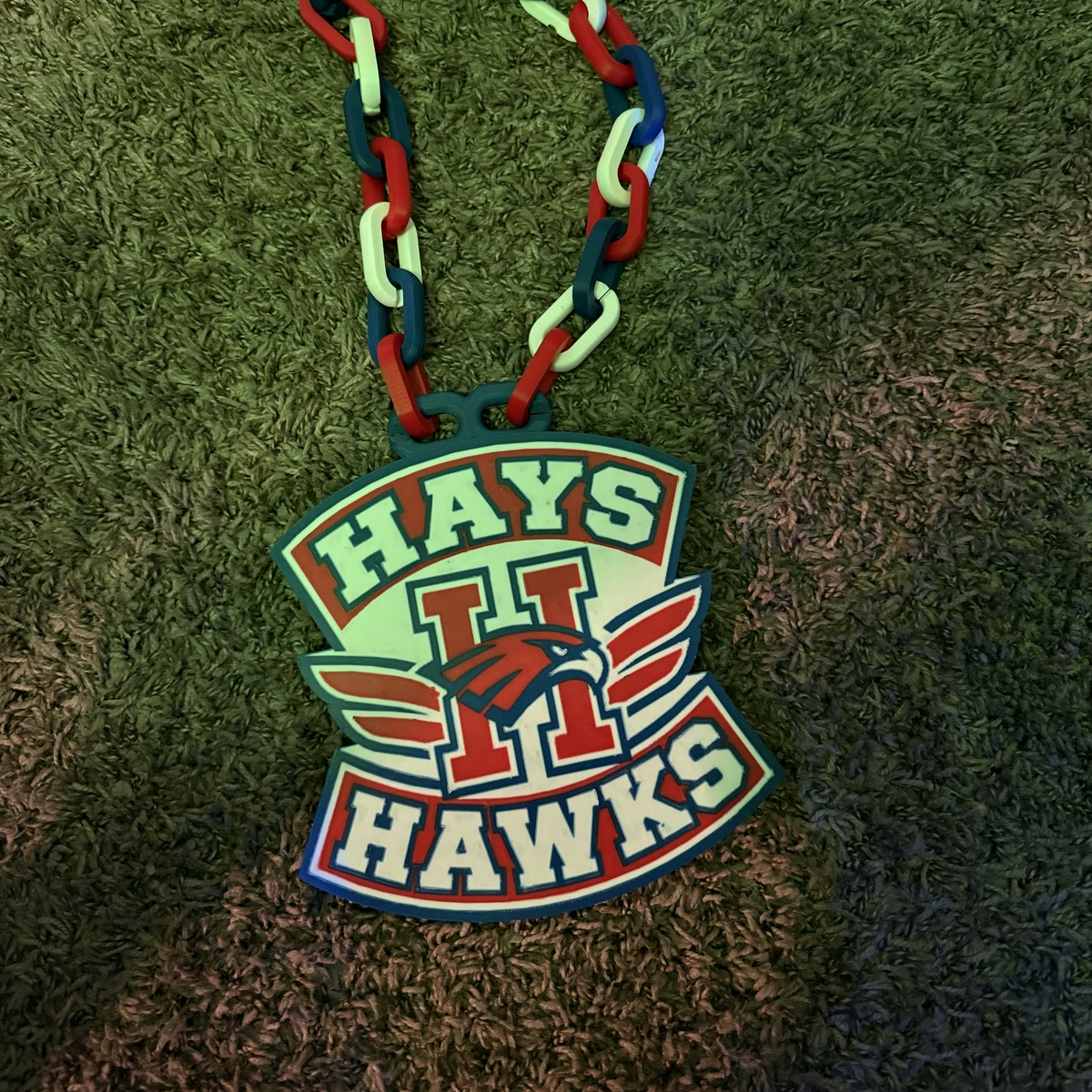 Red, white and blue Hays Hawks fan chain with a layered Hays H Hawks crest pendant.
